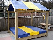 Playground Equipment for Schools - Sand box with coloured cover and canopy